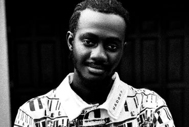 Amos K